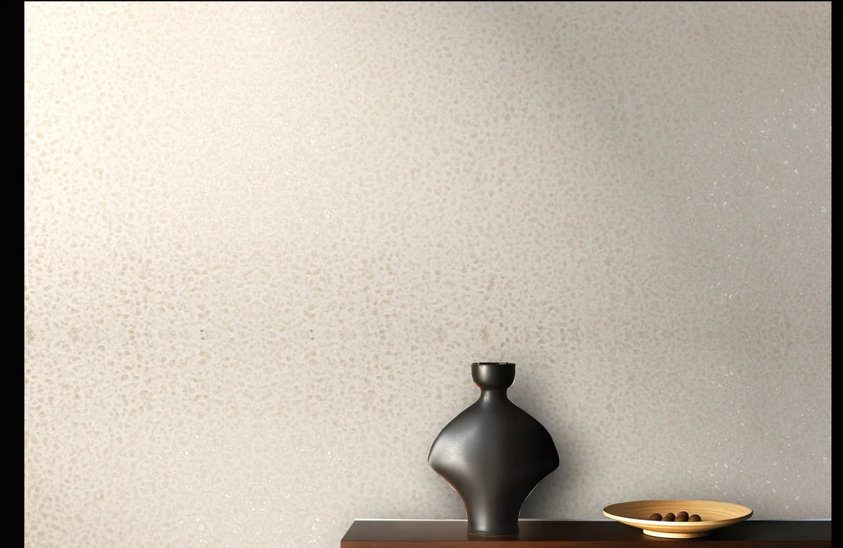 Natural mica wallcovering — mineral flake surface with subtle shimmer and light-catching crystalline texture